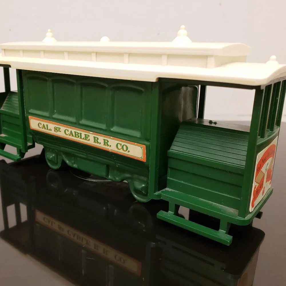 Vintage Avon San Francisco Green CABLE CAR Wild Country Scent Full Glass